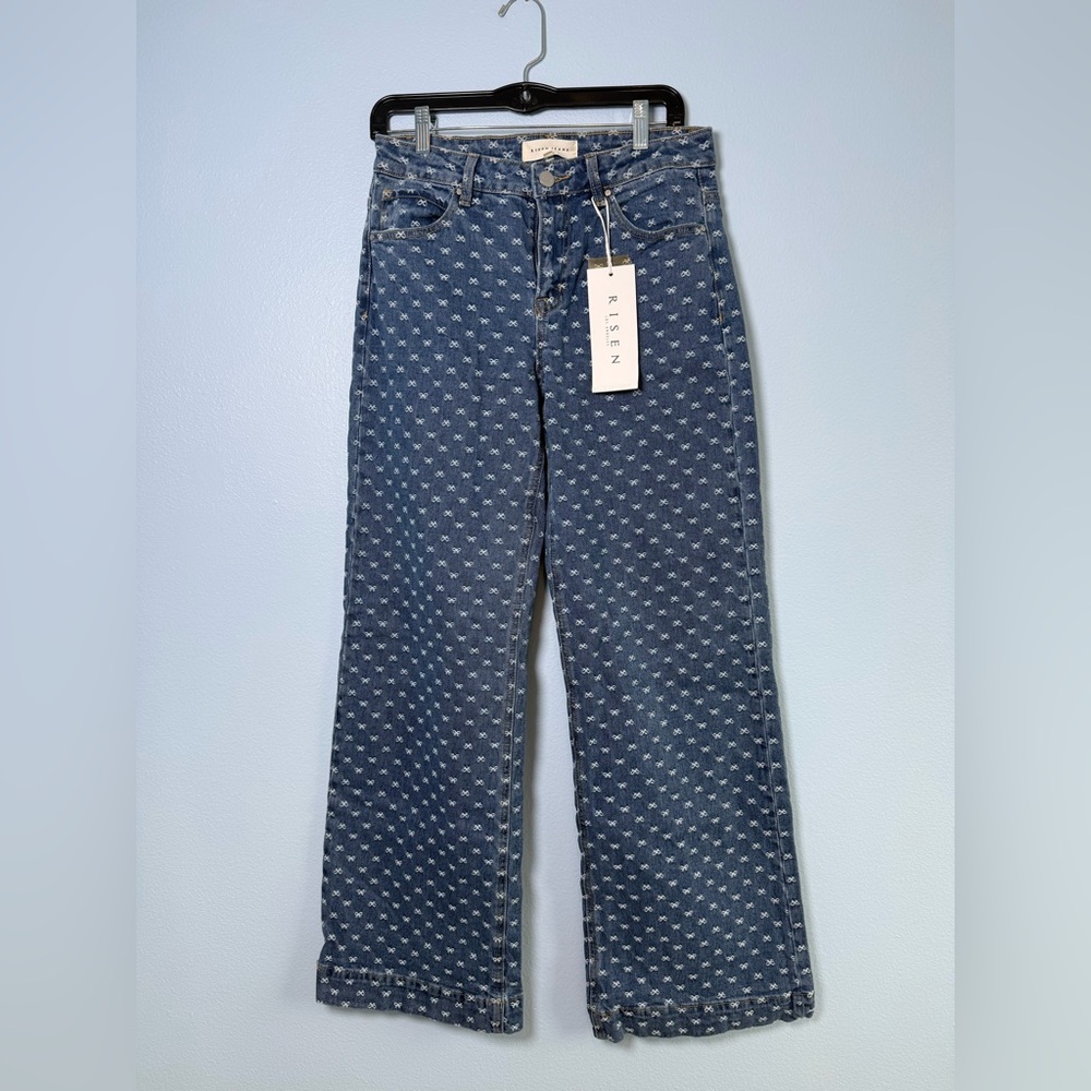 Risen wide leg jeans with bow tie pattern.